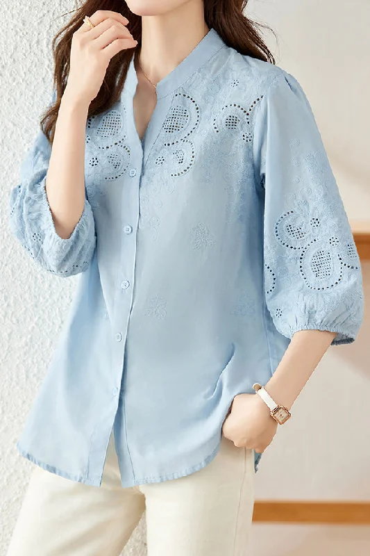 women's tops for those who want to stay on top of the latest fashion trends and wear pieces that are both stylish and on-trendEmbroidered and Hollowed Solid-color Shirt